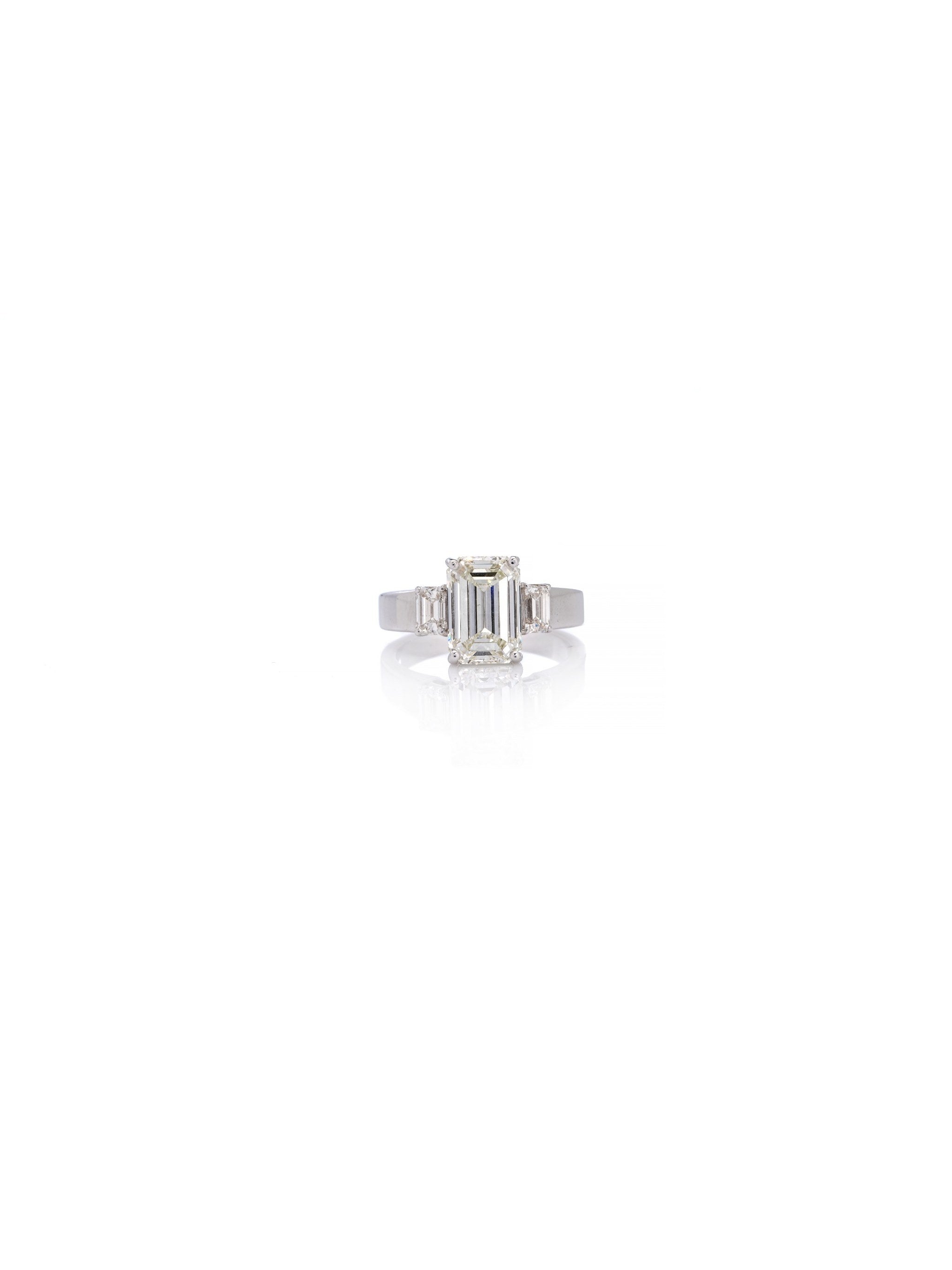 Emerald-Cut Solitaire Diamond Ring in 18K White Gold