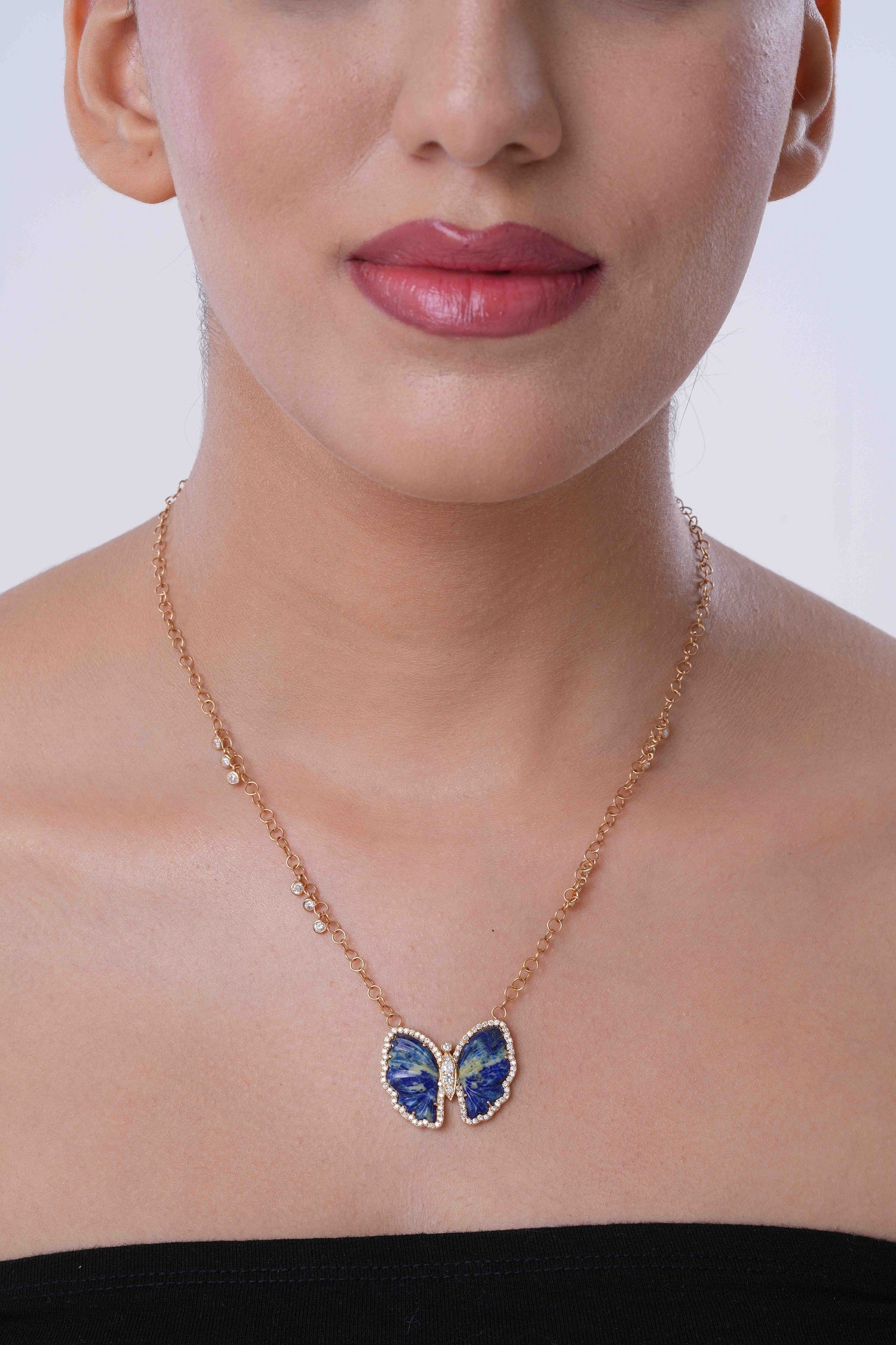 FERAL BLUE BUTTERFLY NECKLACE