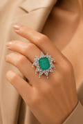 Imperial Emerald Halo Diamond Ring in 18K white gold with a natural emerald and natural diamonds styled for everyday luxury