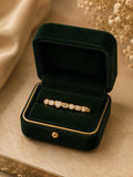 Infinity Luxe Diamond Wrap Ring in 18K rose gold with natural diamonds displayed in Izzari's luxury jewellery box